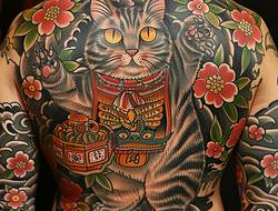 招财猫纹身图案：举爪招福的可爱吉兆